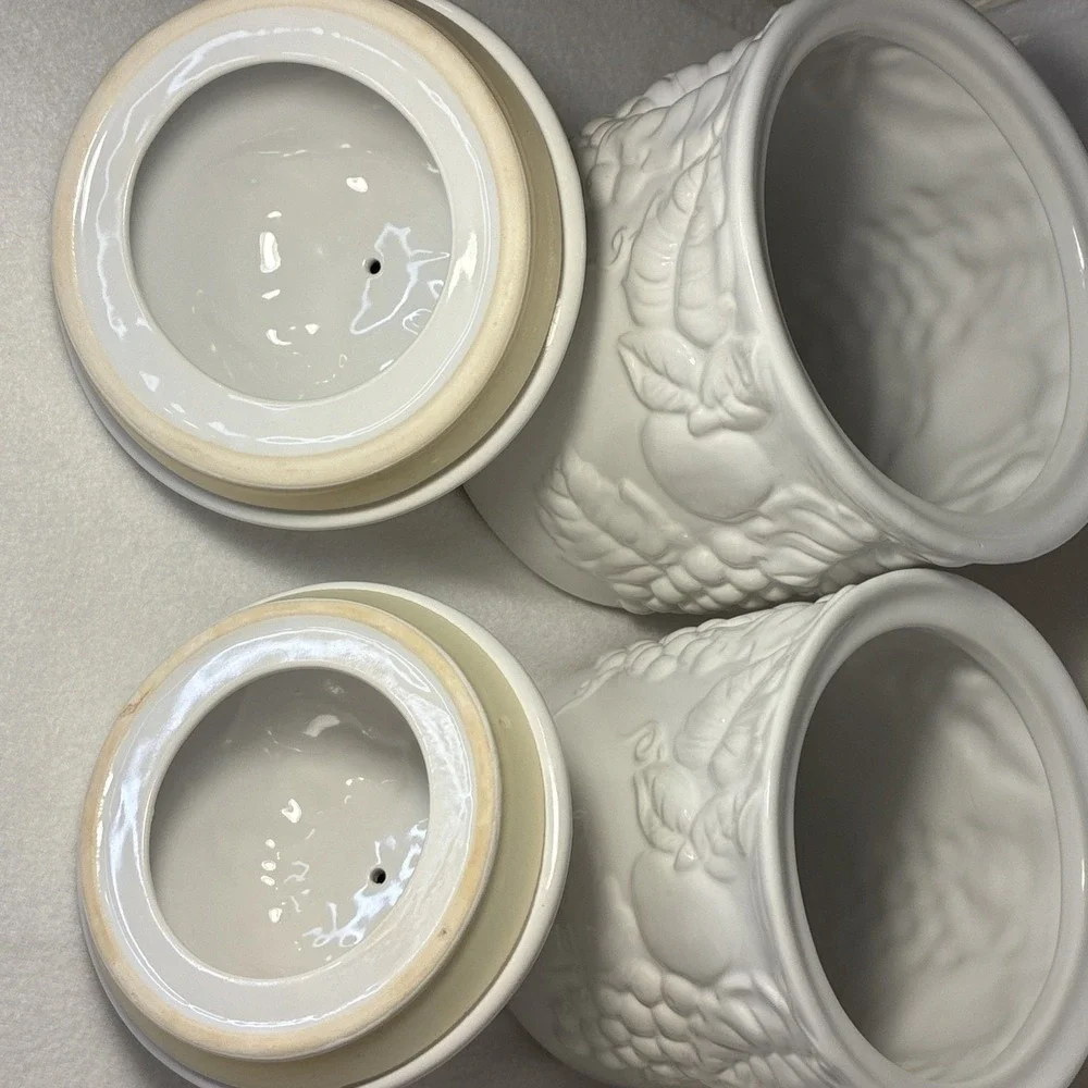 Set of  4 Vintage White Lidded Ceramic Canisters,  Grapevine and Strawberry Lid.